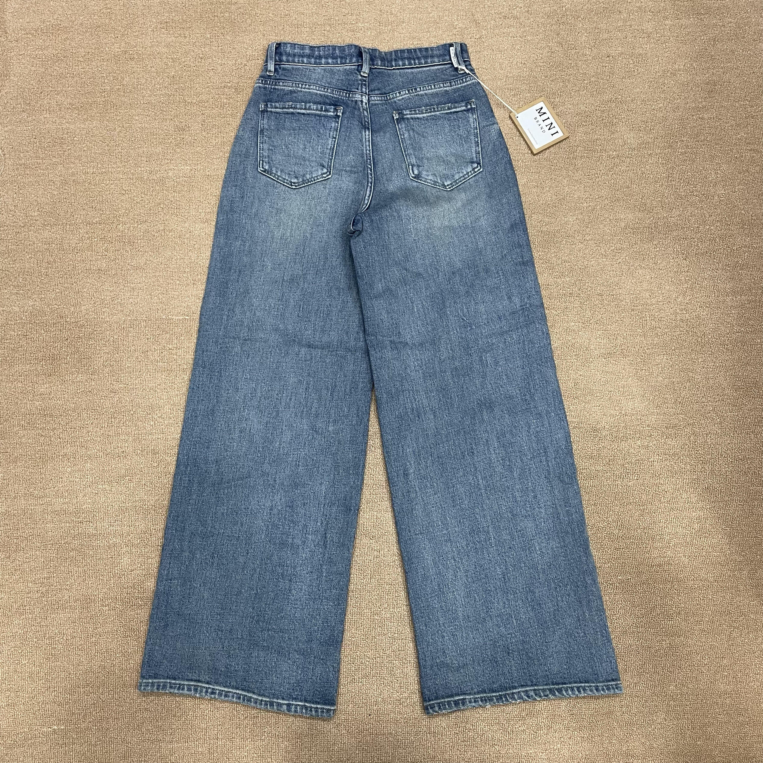 MiniJeans blu nuovi di zecca con elastico a vita alta elasticizzati a gamba larga dal taglio dritto che allungano le gambe e nascondono pantaloni di carne
