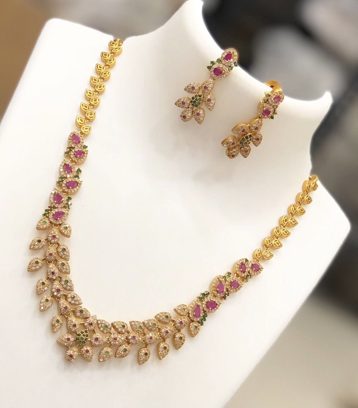 gold necklace with matching earrings