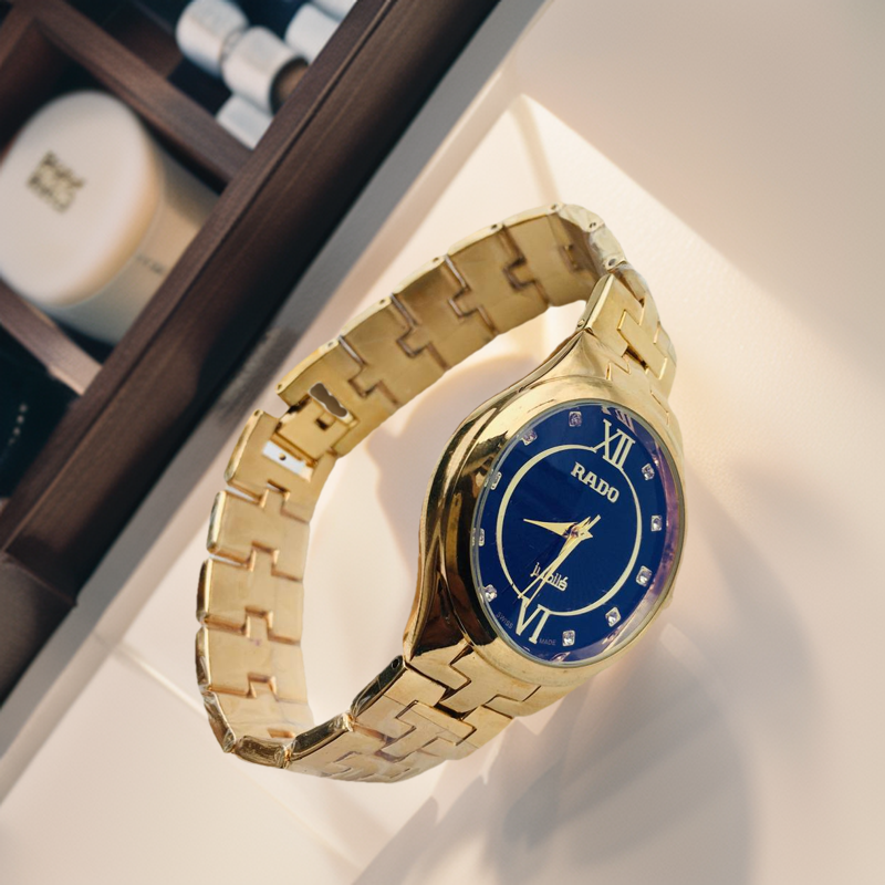 Quartz Blue Glass Black Dial Golden Waterproof Watch For Women. 